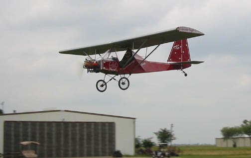 The Double Eagle Airplane  in low flight, photo credit Paul Loghry  
